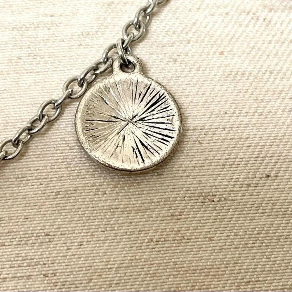 Silver tone disc necklace